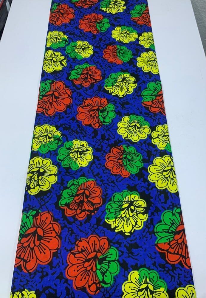 Blue-based Ankara fabric with yellow and red patterns